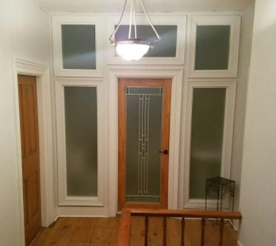 2nd floor main hall with original pine 9 foot floors.