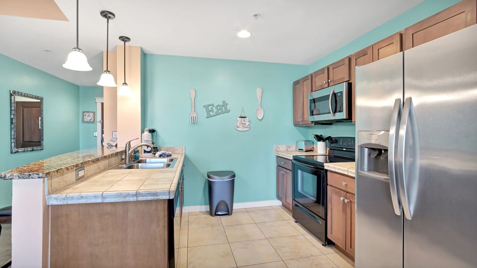 Great kitchen space! Full stove, microwave and full refrigerator for your convenience!