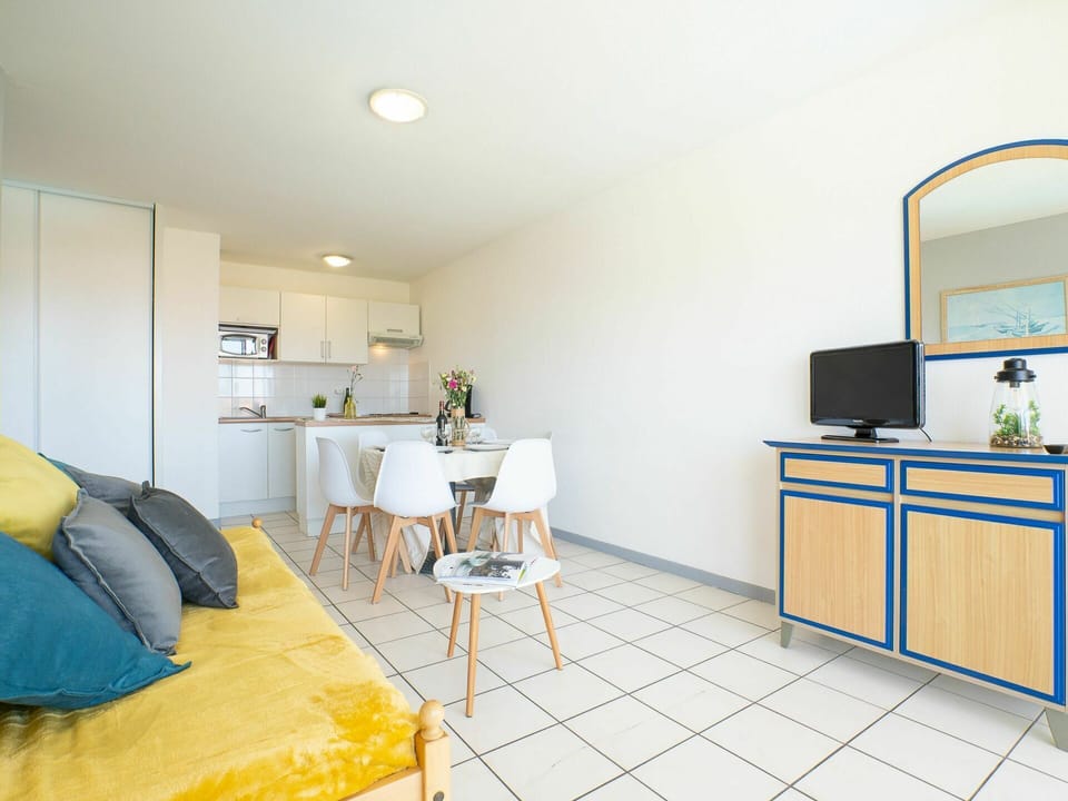 Furniture, Cabinetry, Building, Houseplant, Flowerpot, Television, Drawer, Chest Of Drawers, Table, Interior Design