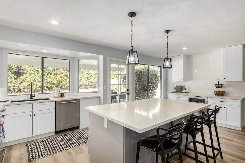 kitchen w/ upgraded SS appliances, kitchen island w/ breakfast bar -- fully loaded kitchen stocked with your comfort in mind!