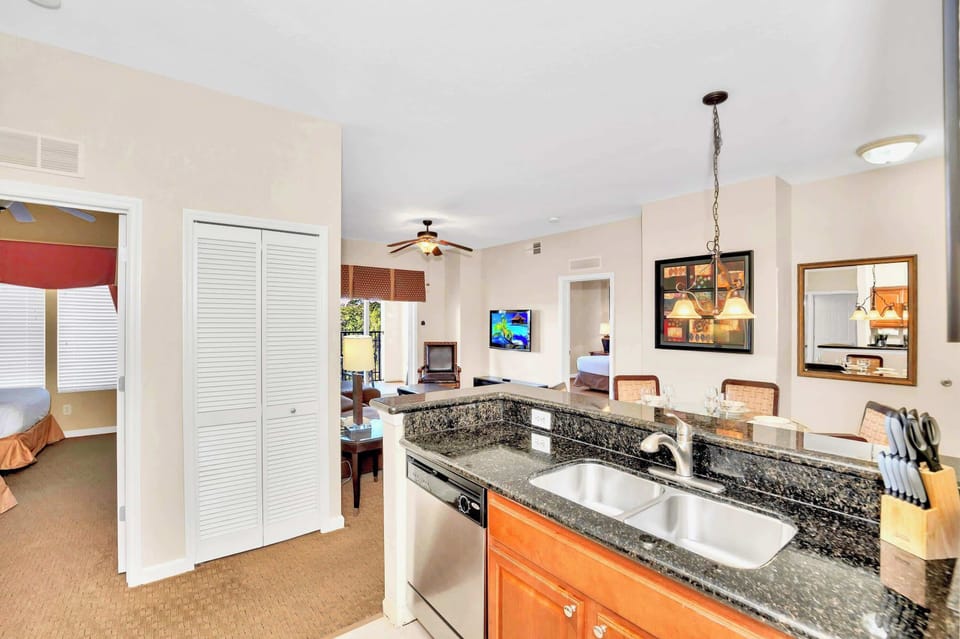 Fully Equipped Kitchen With Granite Countertops And Modern Appliances
