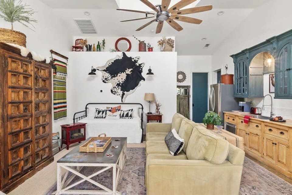 Lovely curated decor. Vaulted dormer creates light and volume yet still so cozy.