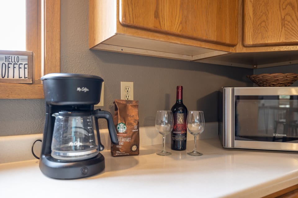 Drip coffee maker--coffee and filters provided. Small french press as well.