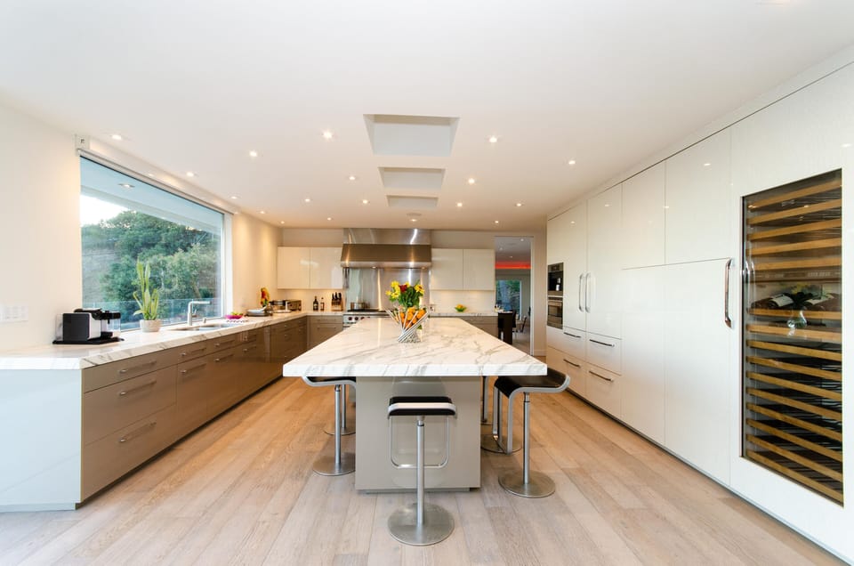 State of the art appliances including a wine fridge and a Miele Espresso maker.
