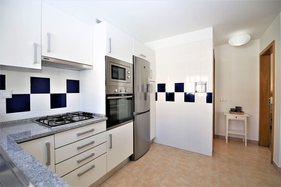 Another view of kitchen with all the appliances necessary for your holiday