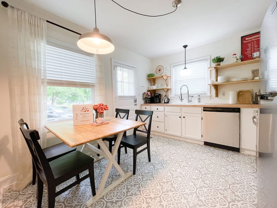 Bright lighting in kitchen.  Fully equipped for cooking.