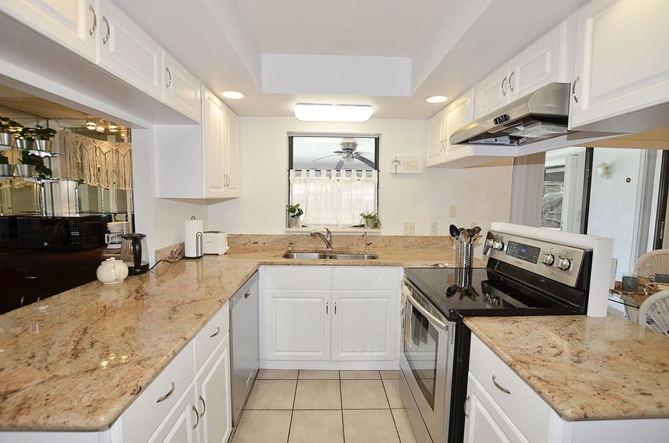 Kitchen is snug but fully supplied.