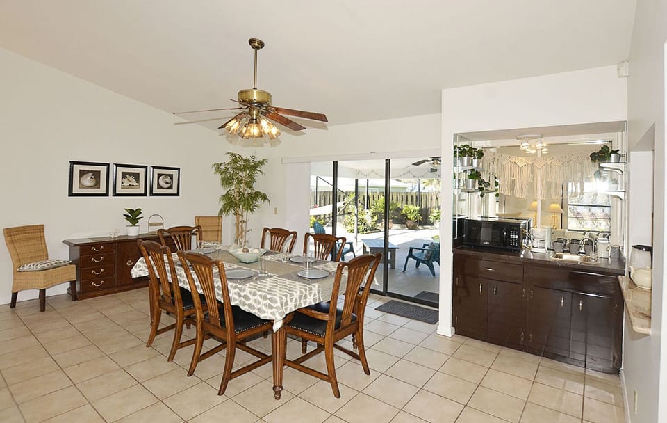 Dining area with adjacent coffee and tea station; starter amenities provided.