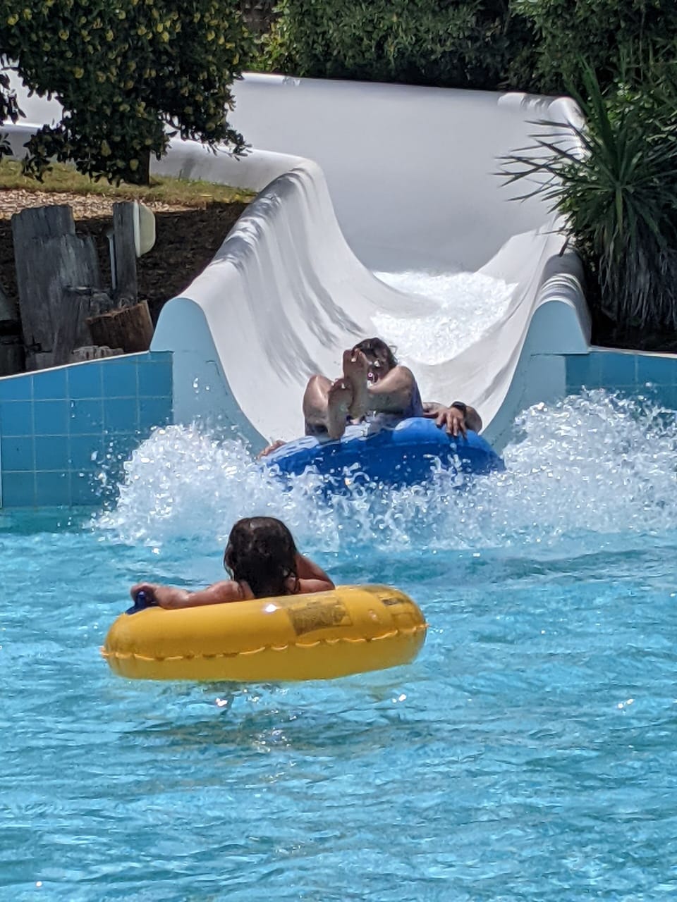 150ft water slide into main outdoor pool makes for a fun time for all!