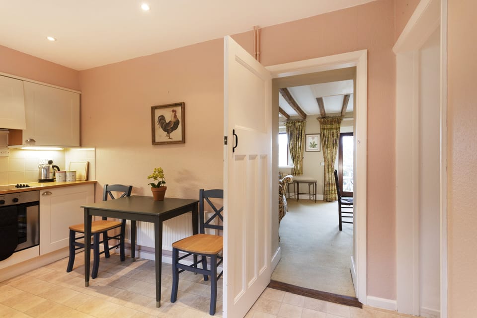 Kitchen, with views through the sitting room to the garden