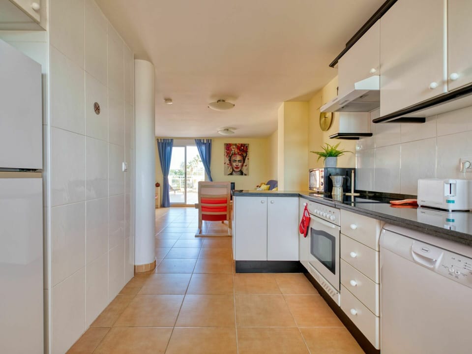 Cabinetry, Building, Countertop, Furniture, Kitchen Appliance, Kitchen Stove, House, Kitchen, Home Appliance, Chair