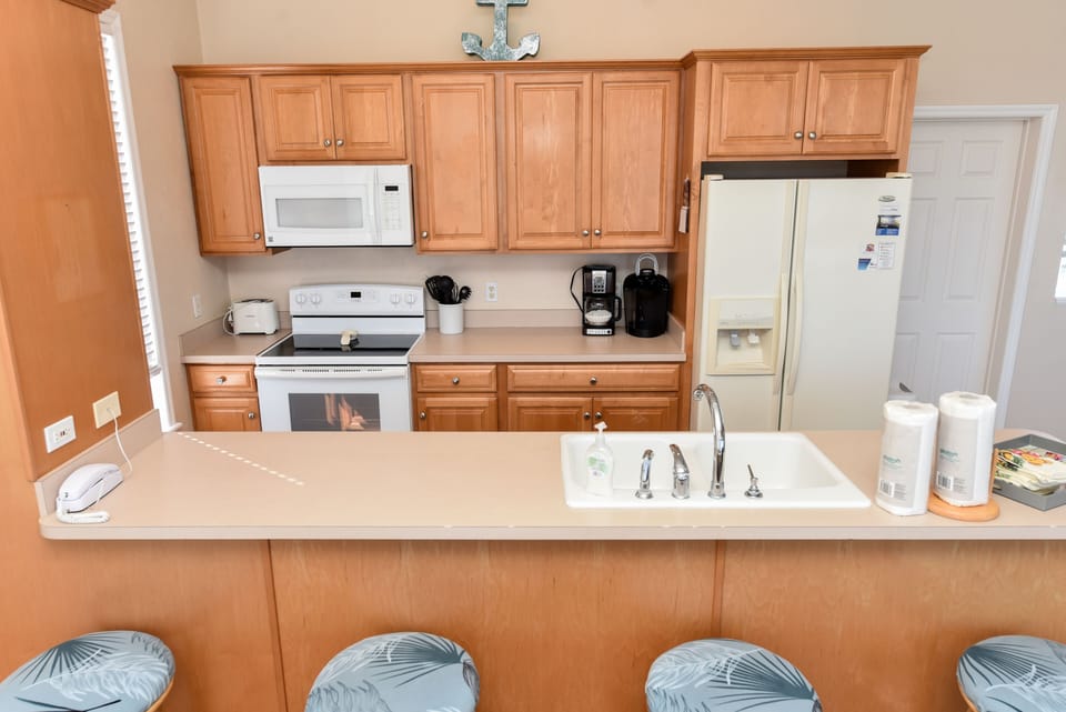 Kitchen counter has just been updated with quartzite and stainless sink!