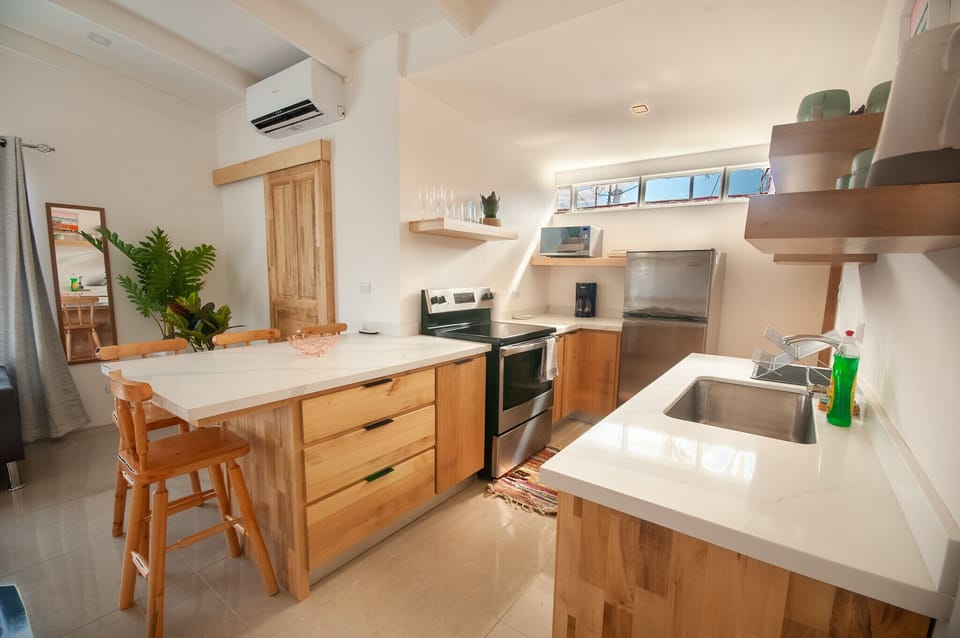 Kitchen fully stocked with all appliances needed