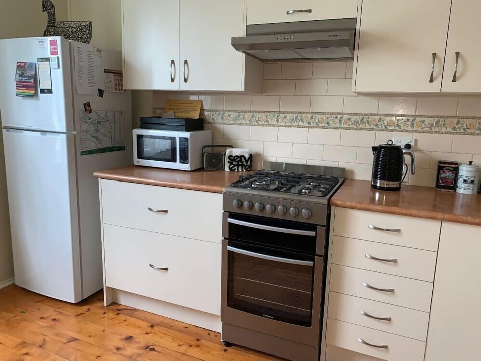 Gas cook top with fan forced electric oven