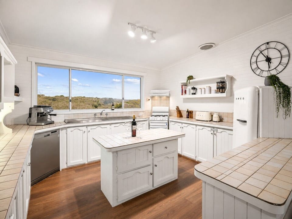 A spacious kitchen designed for easy cooking and gathering.