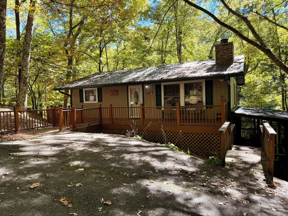 One of two level parking spaces. No steps into entrance