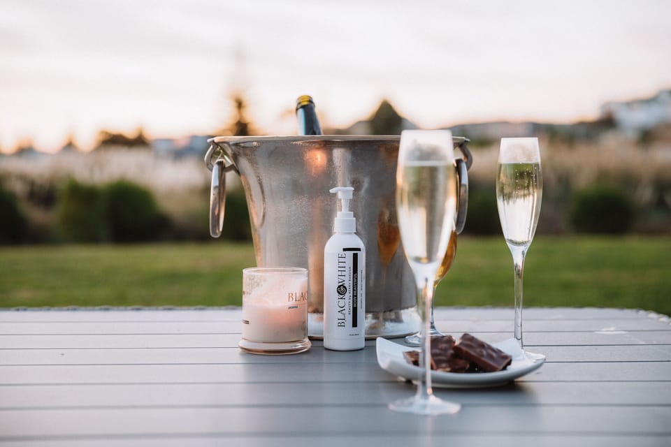 Champagne on the deck with our BLACK&WHITE candles and products