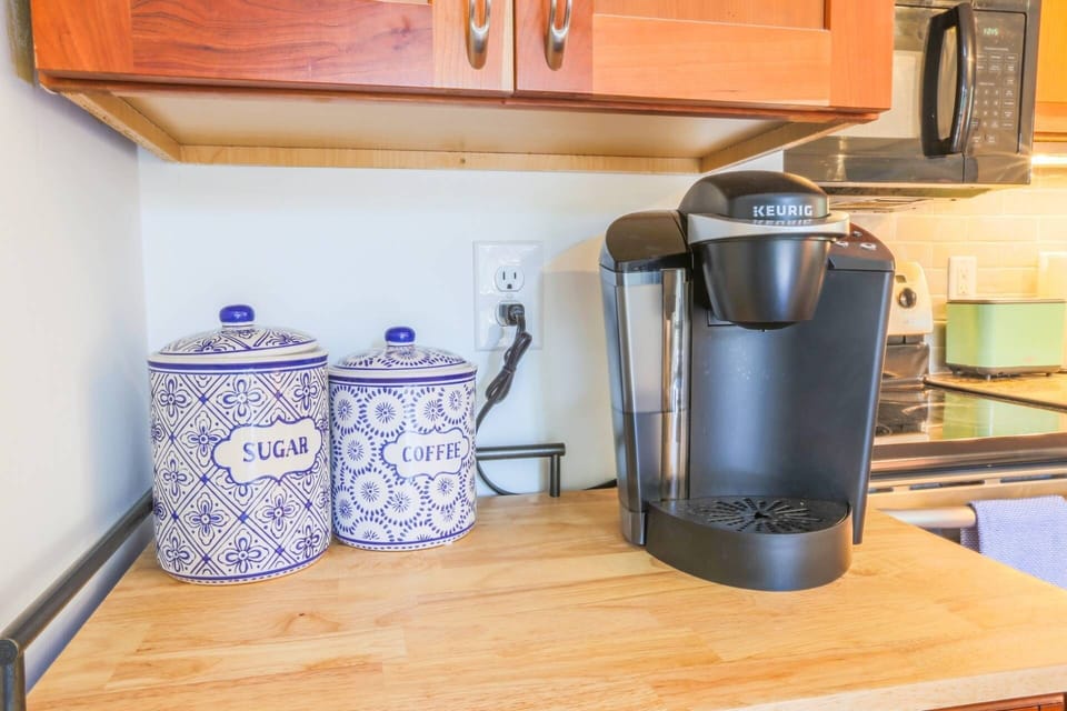 There is a keurig coffee maker available for your use.