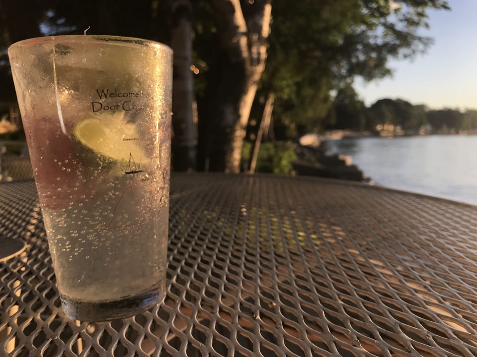 Cooling drinks on the shorefront deck.  Views and privacy can't be beat!