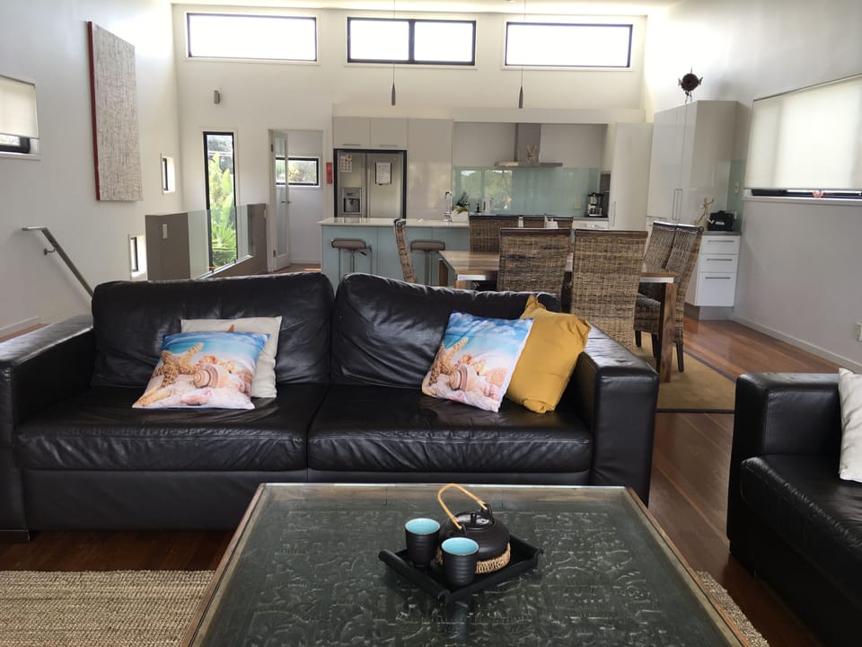 Looking across lounge, dining and kitchen upstairs