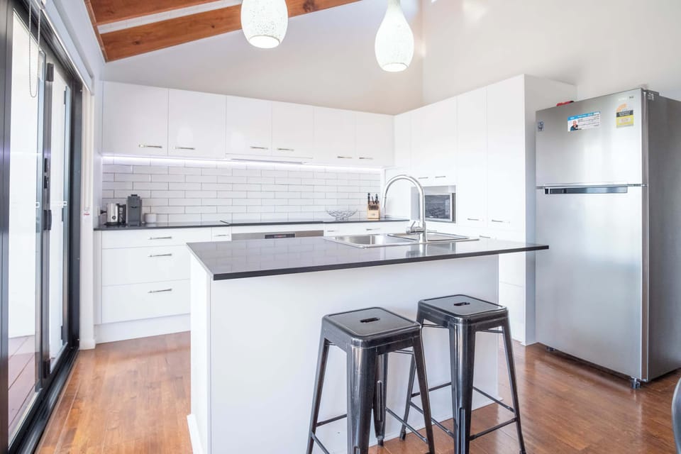 The kitchen contains everything you would need while away from home.