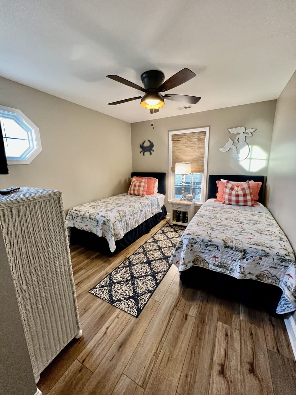 Upper level 3rd bedroom with two XL twin beds, closet and smart tv.