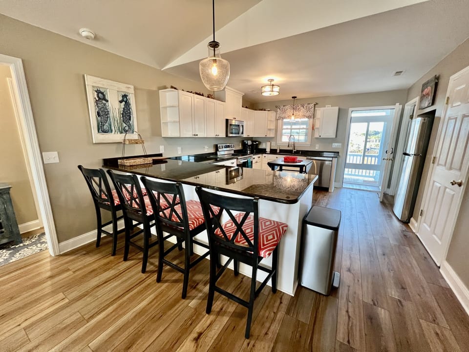 Upper level breakfast bar with seating for 4.