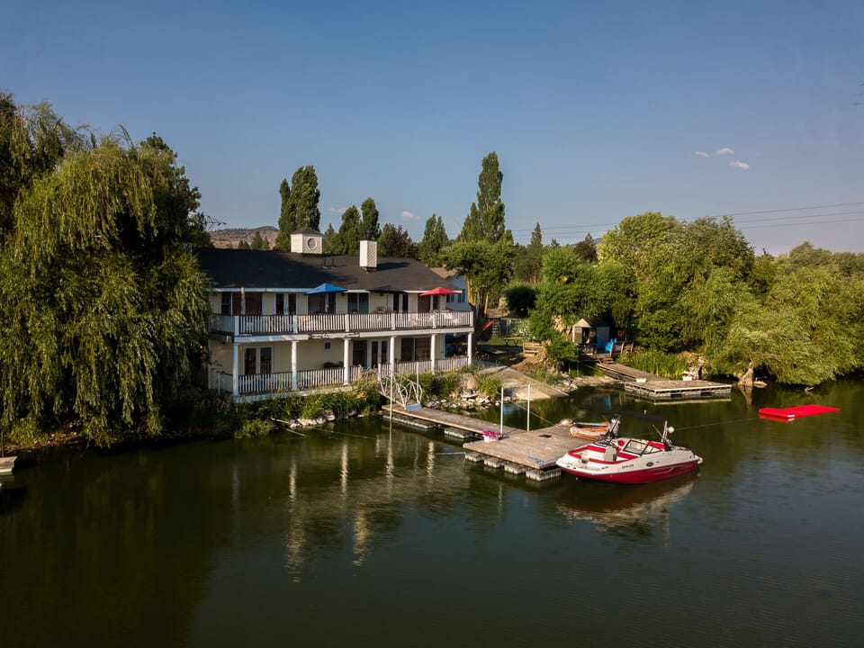 drone view of lakefront house