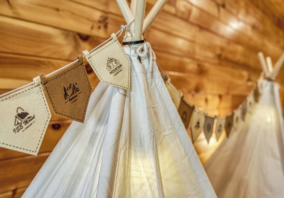 Kids will make cozy, camp-style memories in their own private teepees.