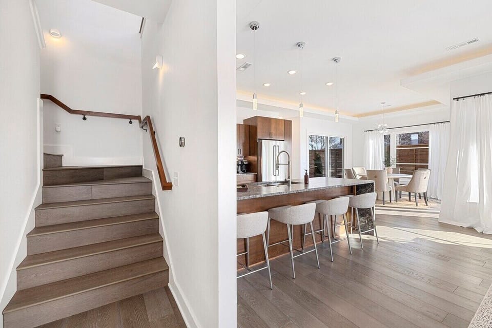 Upon entry, guests are greeted by ample amounts of natural light in our open floor plan living space.