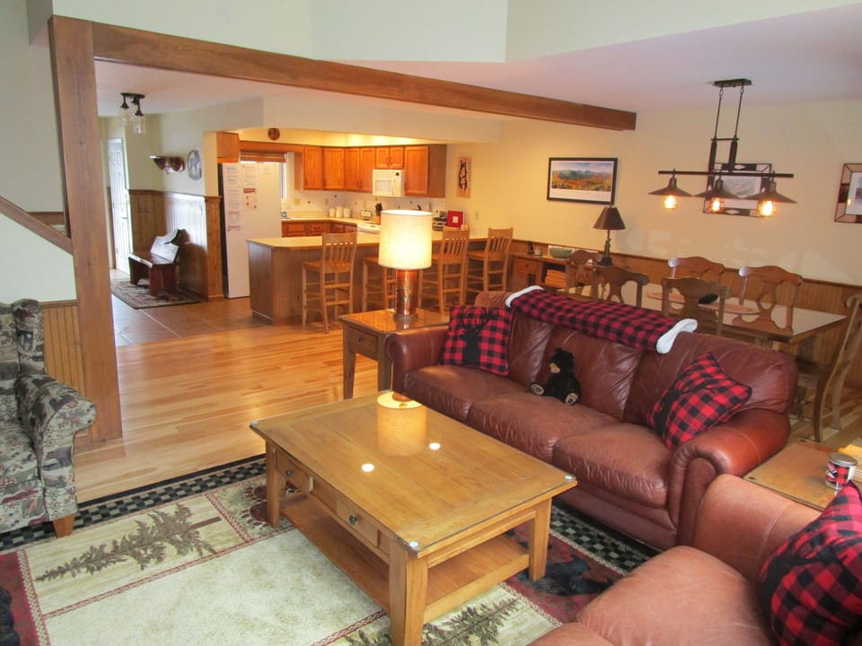 Open living, dining and kitchen area.