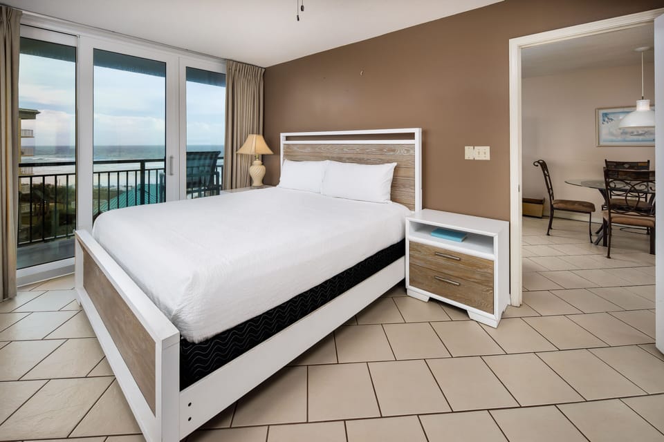 Master bedroom king with balcony access
