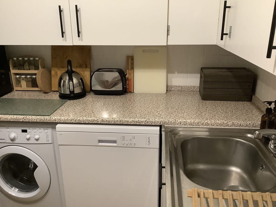 Dishwasher and washer-dryer
