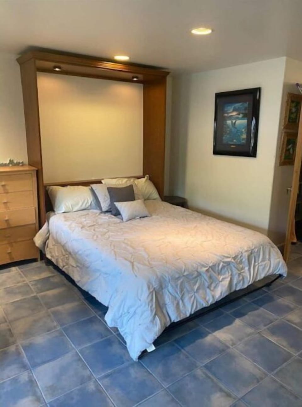 Very comfy queen size murphy bed which can be closed for more space, sleeps 2
