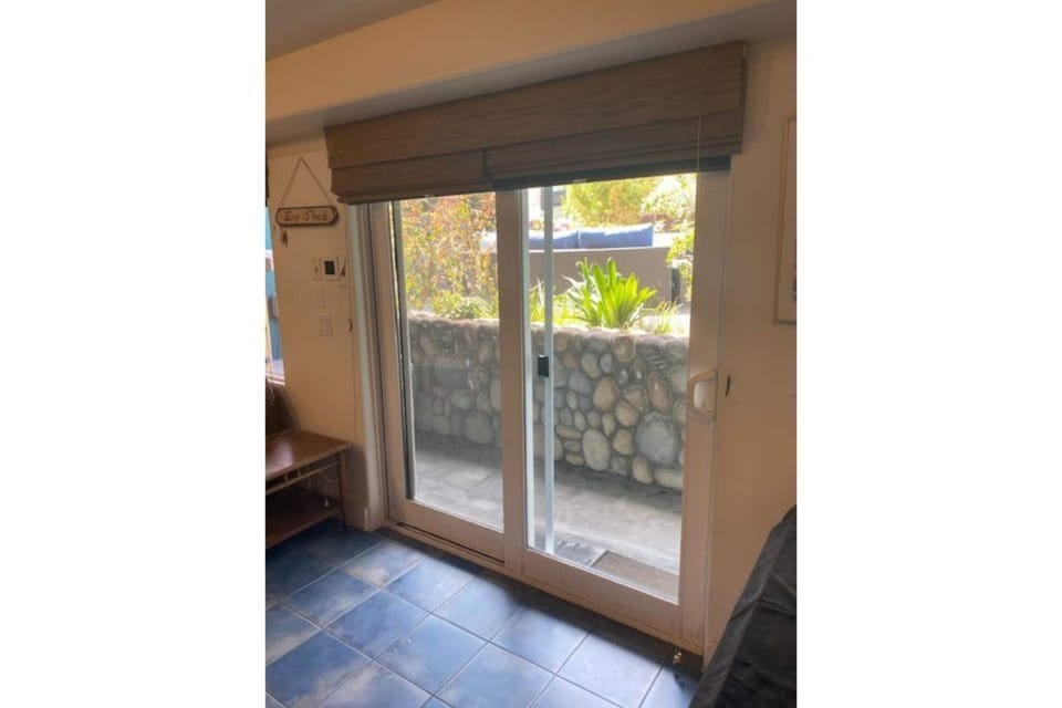 Private entrance with patio.