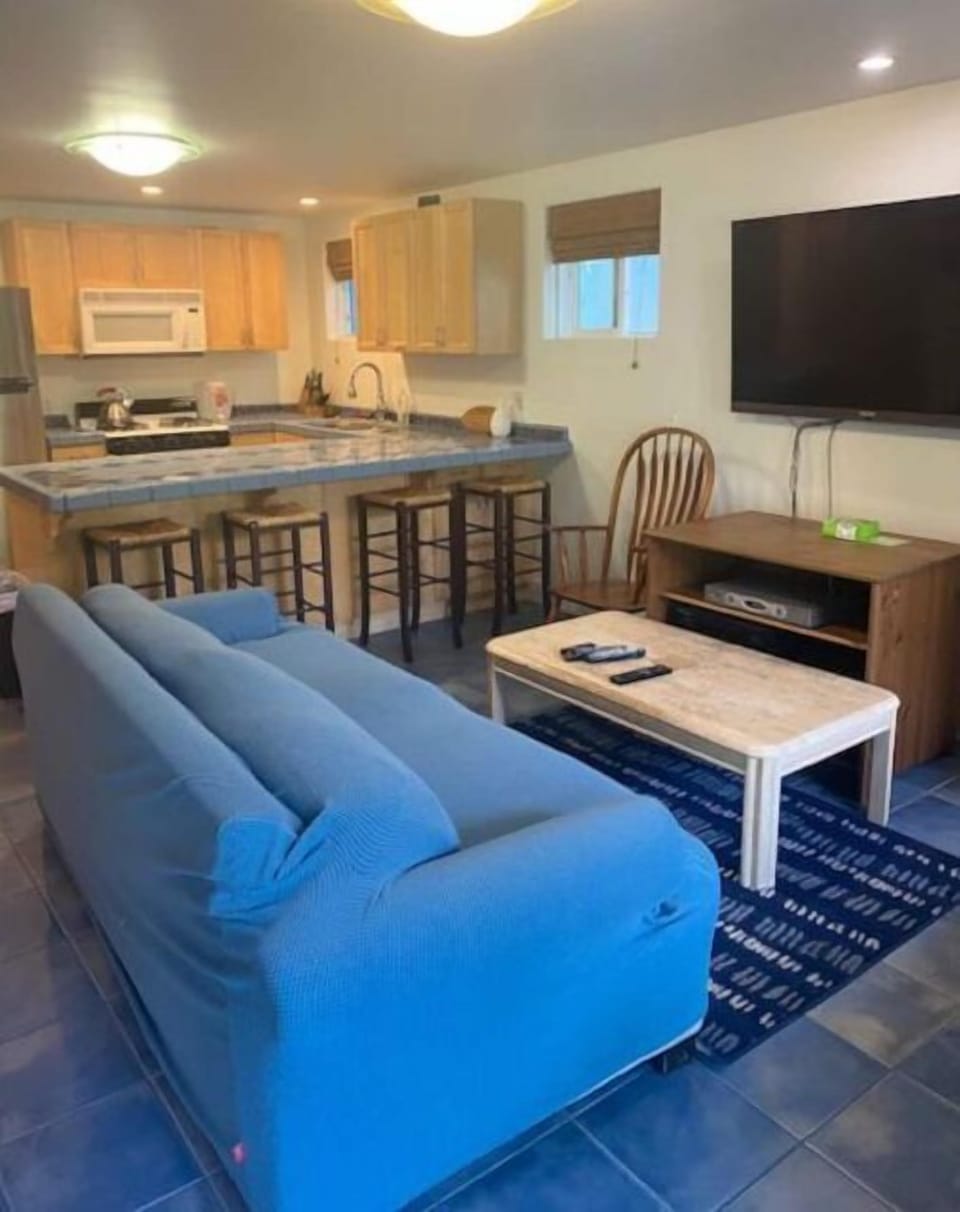 Living room with view of kitchen