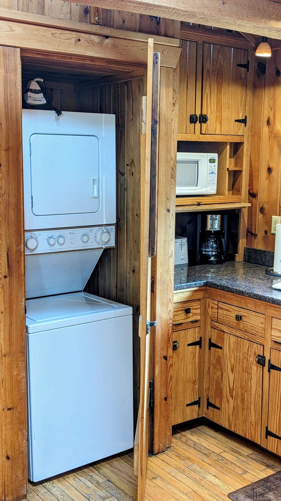 Small stack washer and dryer complete with dryer sheets and laundry soap. 
