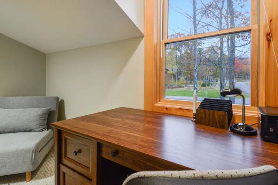 Home office has a futon, perfect for little ones and connected to bedroom #2.