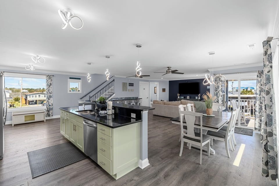 Dine in elegance in this soothing space, adorned with contemporary touches and bathed in natural light, creating a perfect blend of comfort and style.