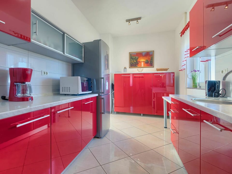 Cabinetry, Countertop, Property, Furniture, Kitchen Appliance, Home Appliance, Kitchen Stove, Building, Kitchen, Interior Design