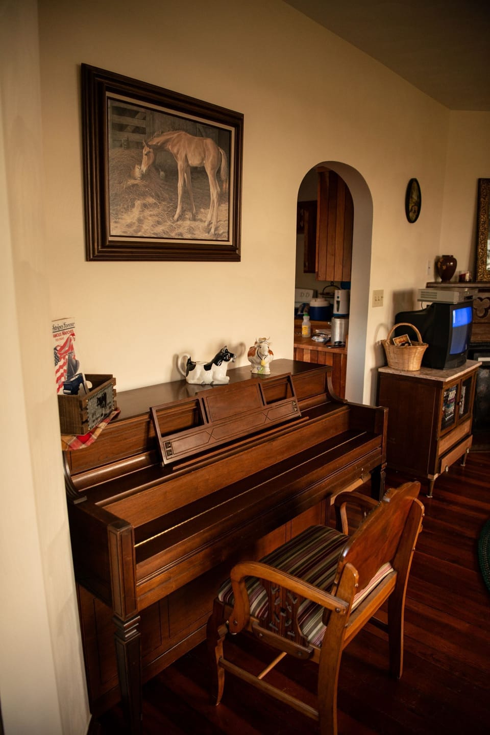 living room with piano