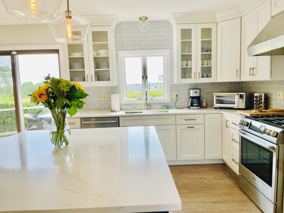 Kitchen with slider to deck