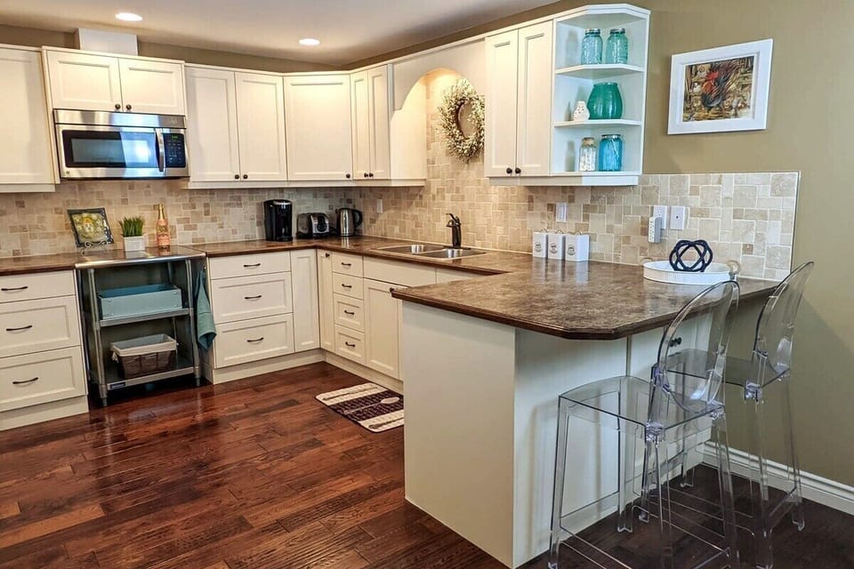 Kitchen includes dishwasher, microwave, many other appliances, pots & pans etc.