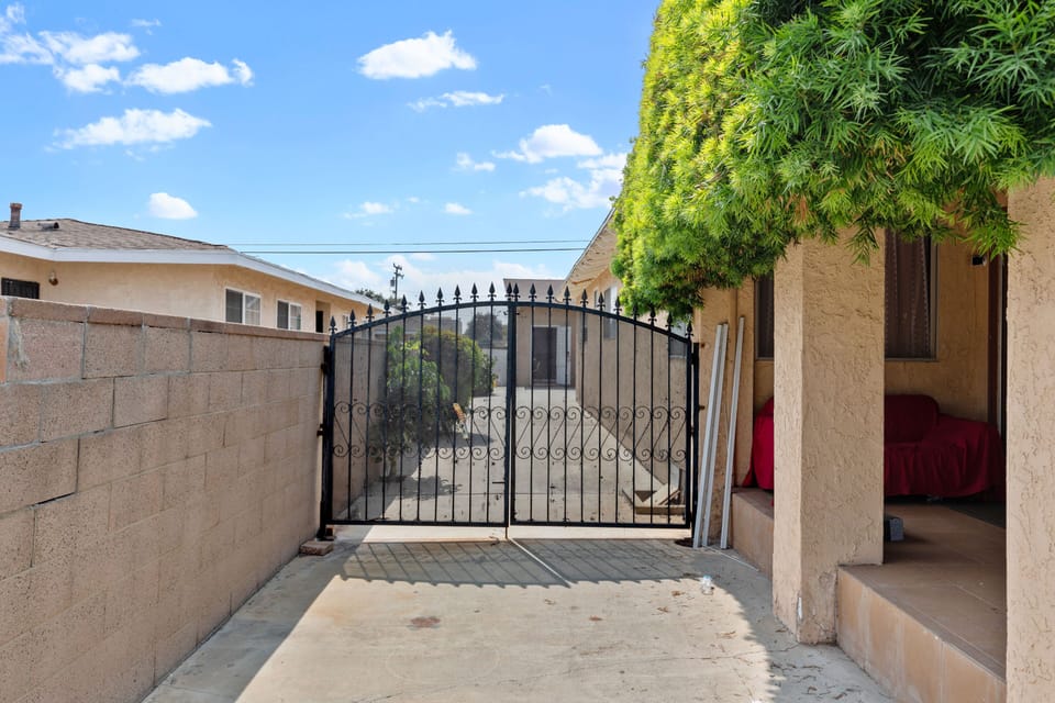 Pass gate to Guest house behind.