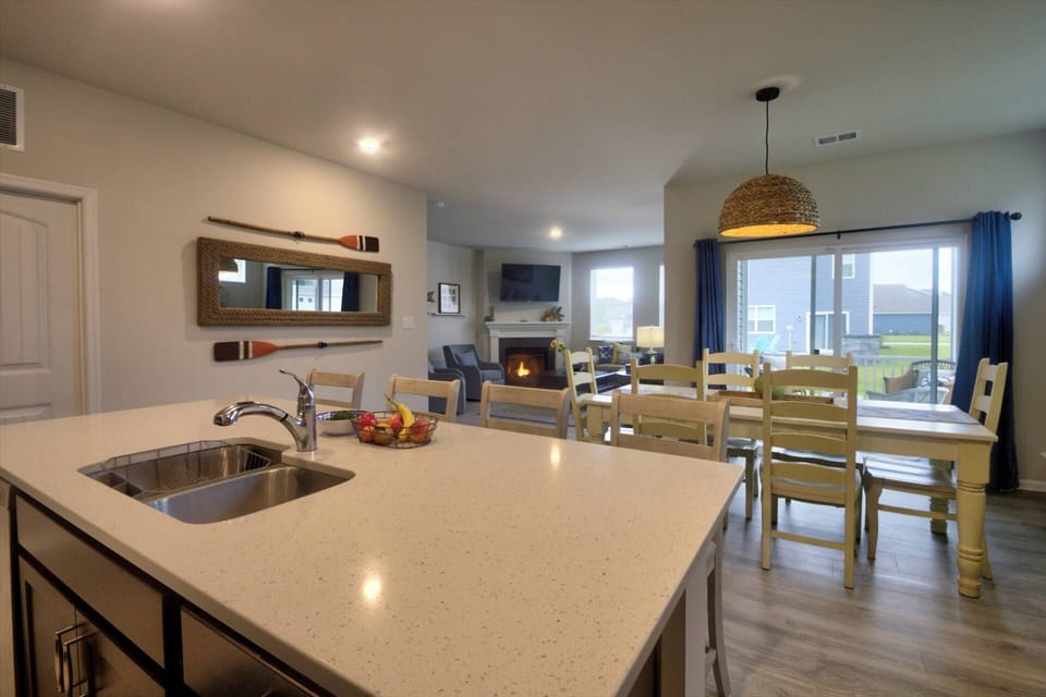 Marvelous open plan kitchen, living room, and dining room.