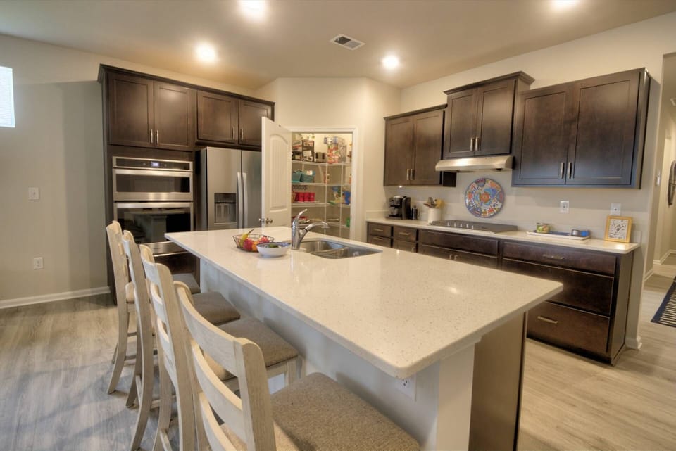 Marvelous open plan kitchen, living room, and dining room.