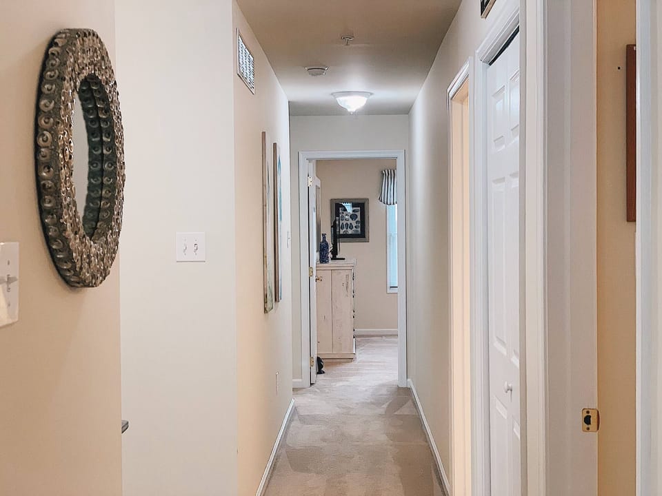 hallway to utility room, public bathroom and bedrooms - hallway to utility room, public bathroom and bedrooms