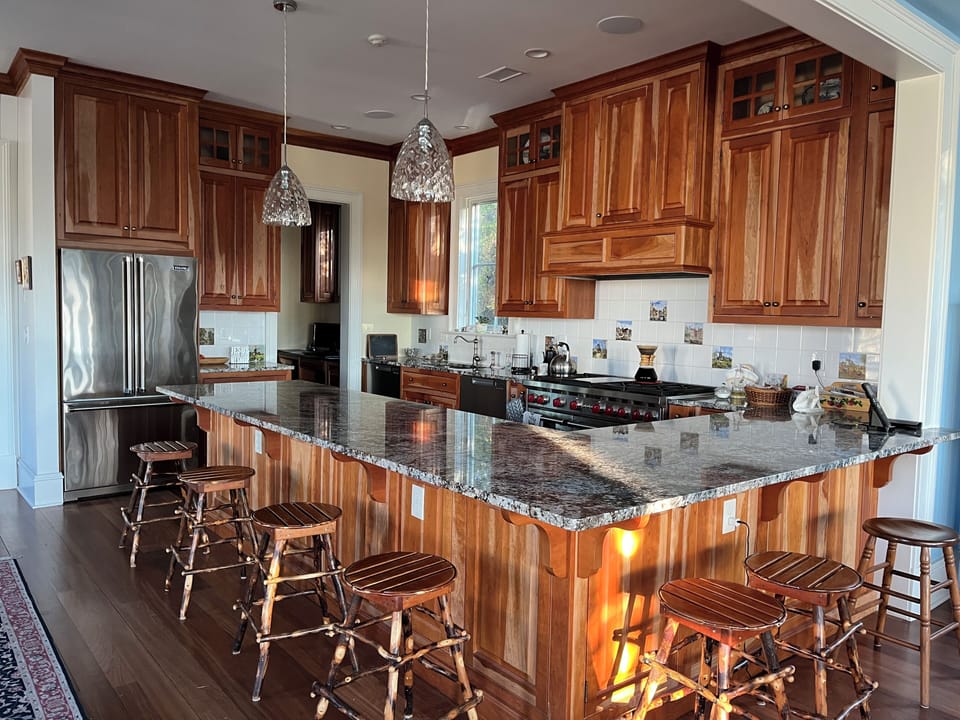 12 and 8 foot counters for  food prep or casual eating. Study off kitchen .