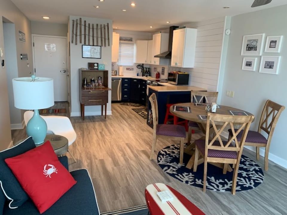 Dining area includes 2 stools for new kitchen peninsula