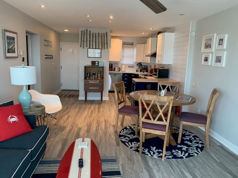 Completely open floor plan recently updated with new paint, flooring & furniture